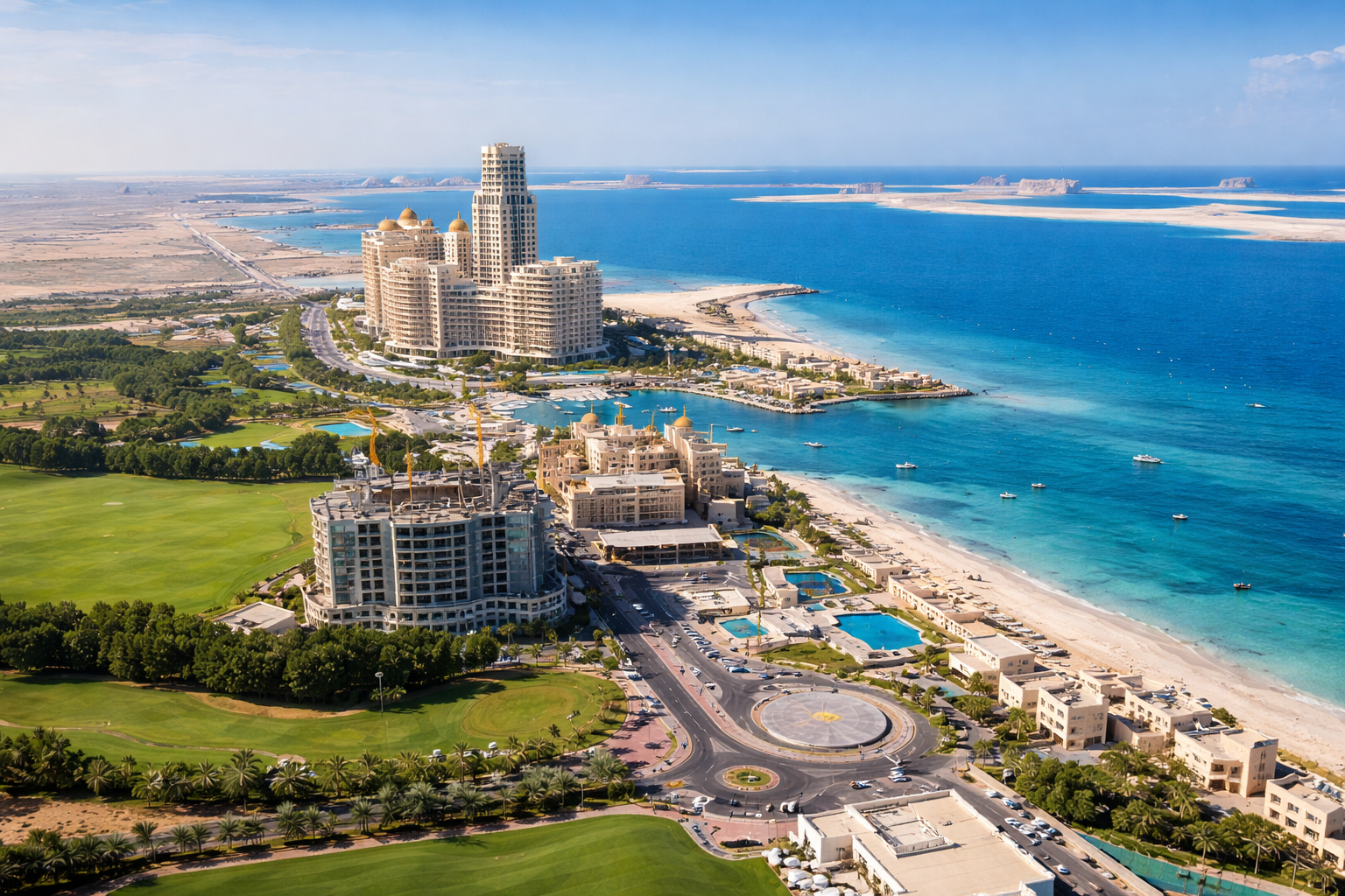 Ras Al Khaimah coastline with beachfront resorts showcasing top things to do in Ras Al Khaimah